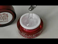 Carica l'immagine nel visualizzatore della galleria, alt="3in1 Clear Gel by Nail Artists – transparent builder gel being applied with spatula"